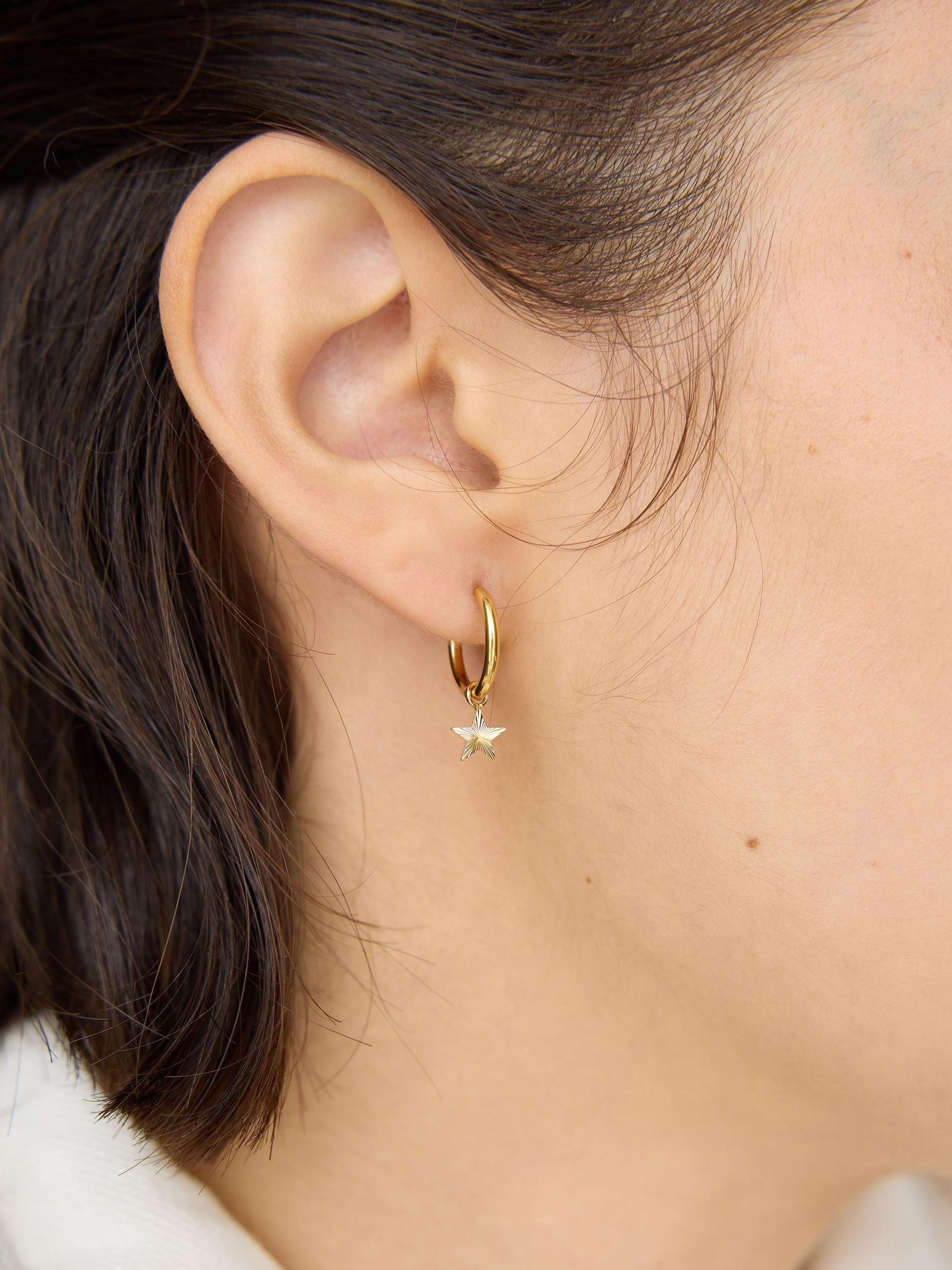 Oliver Bonas gold tone star hoop earrings (British brand)