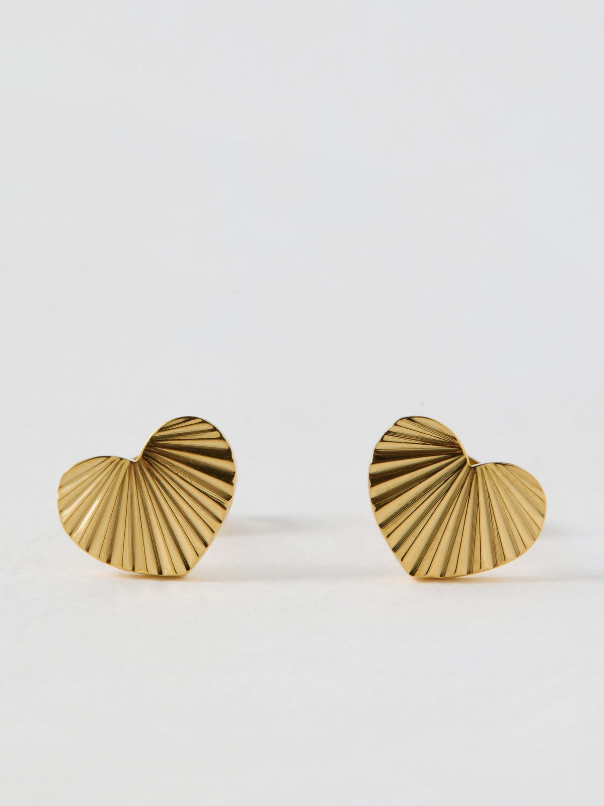 Oliver Bonas gold tone heart stud earrings (British brand)