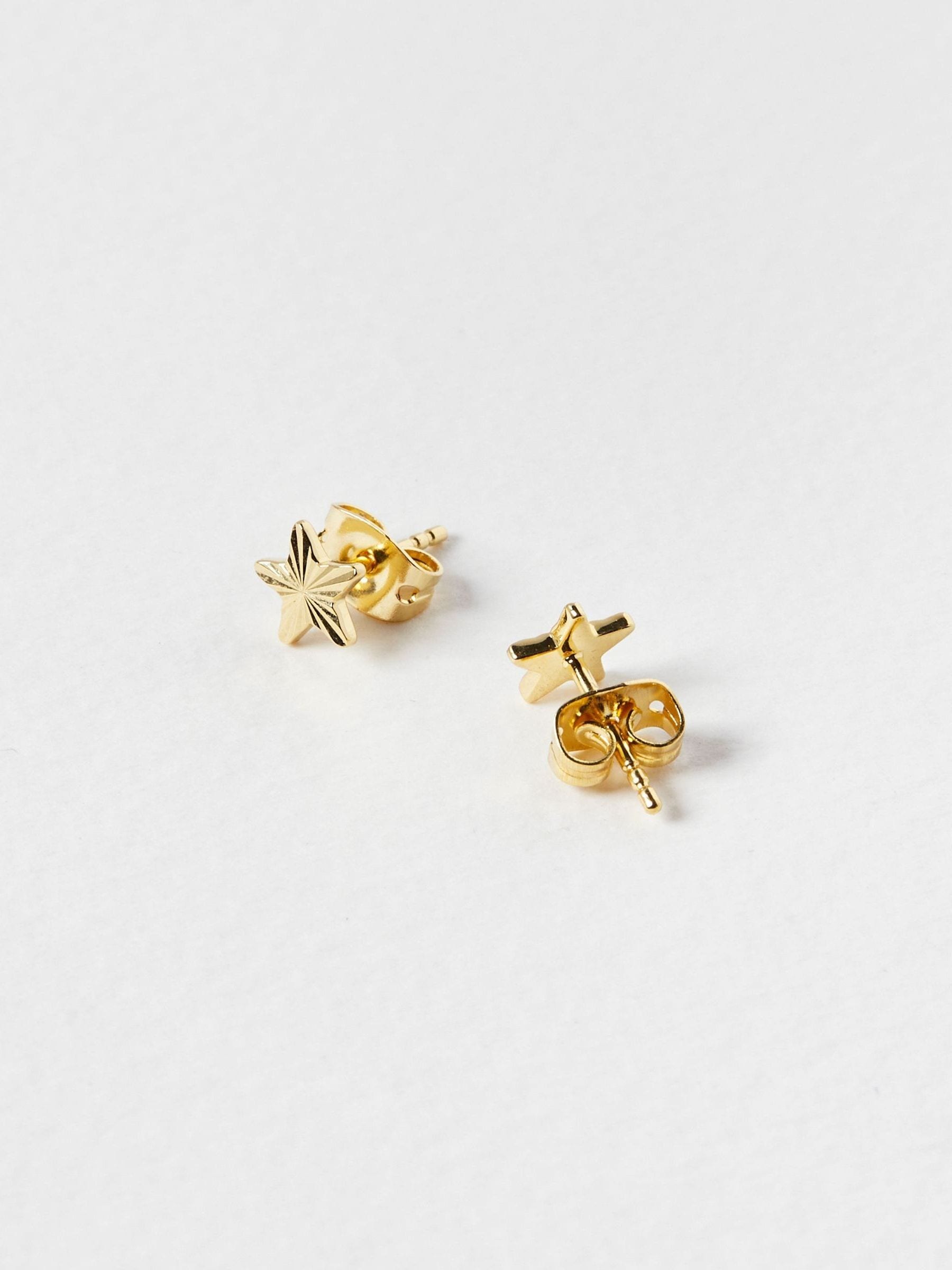 Oliver Bonas gold plated star stud earrings, imported from the UK