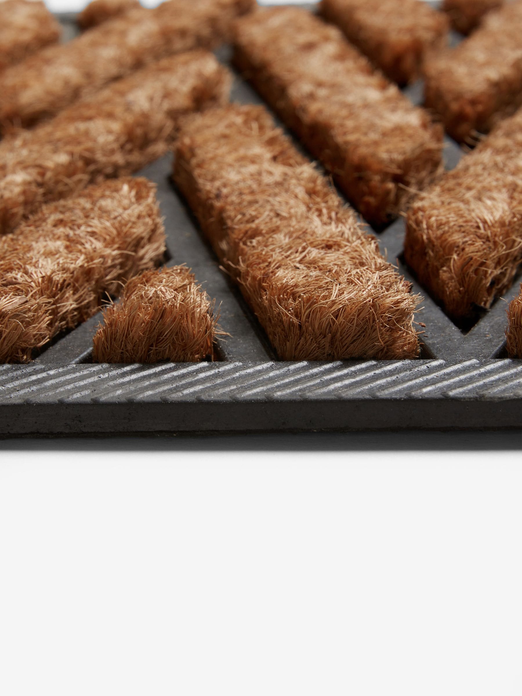 Herringbone coir rubber doormat with non-slip backing, imported from the UK