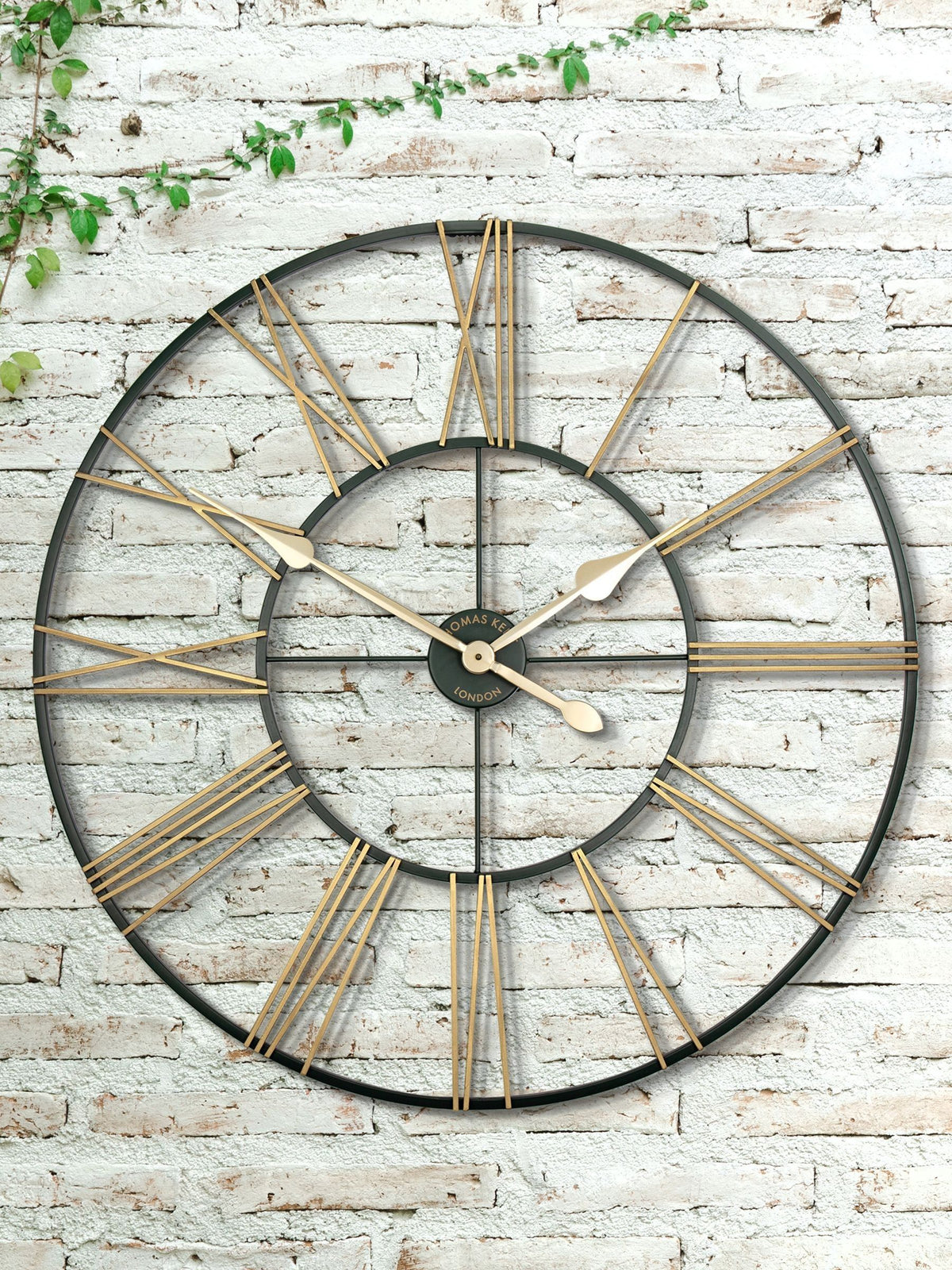 Thomas Kent green and gold oversized skeleton wall clock (British brand)