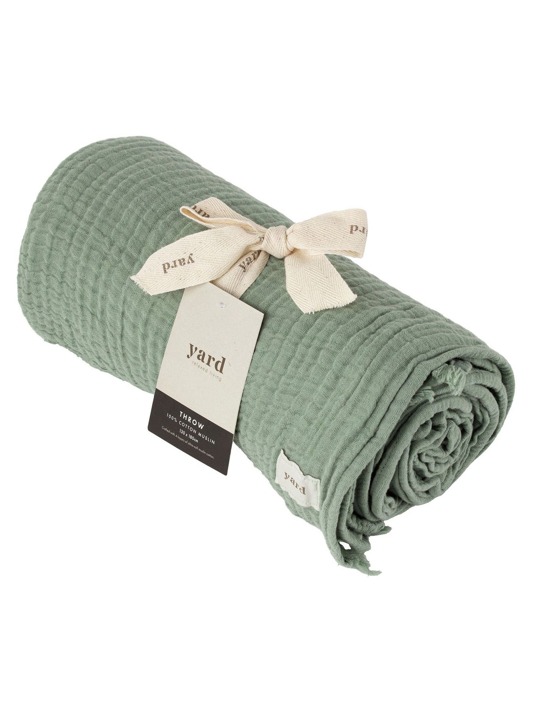 Lark muslin crinkle cotton throw in eucalyptus green (British brand)