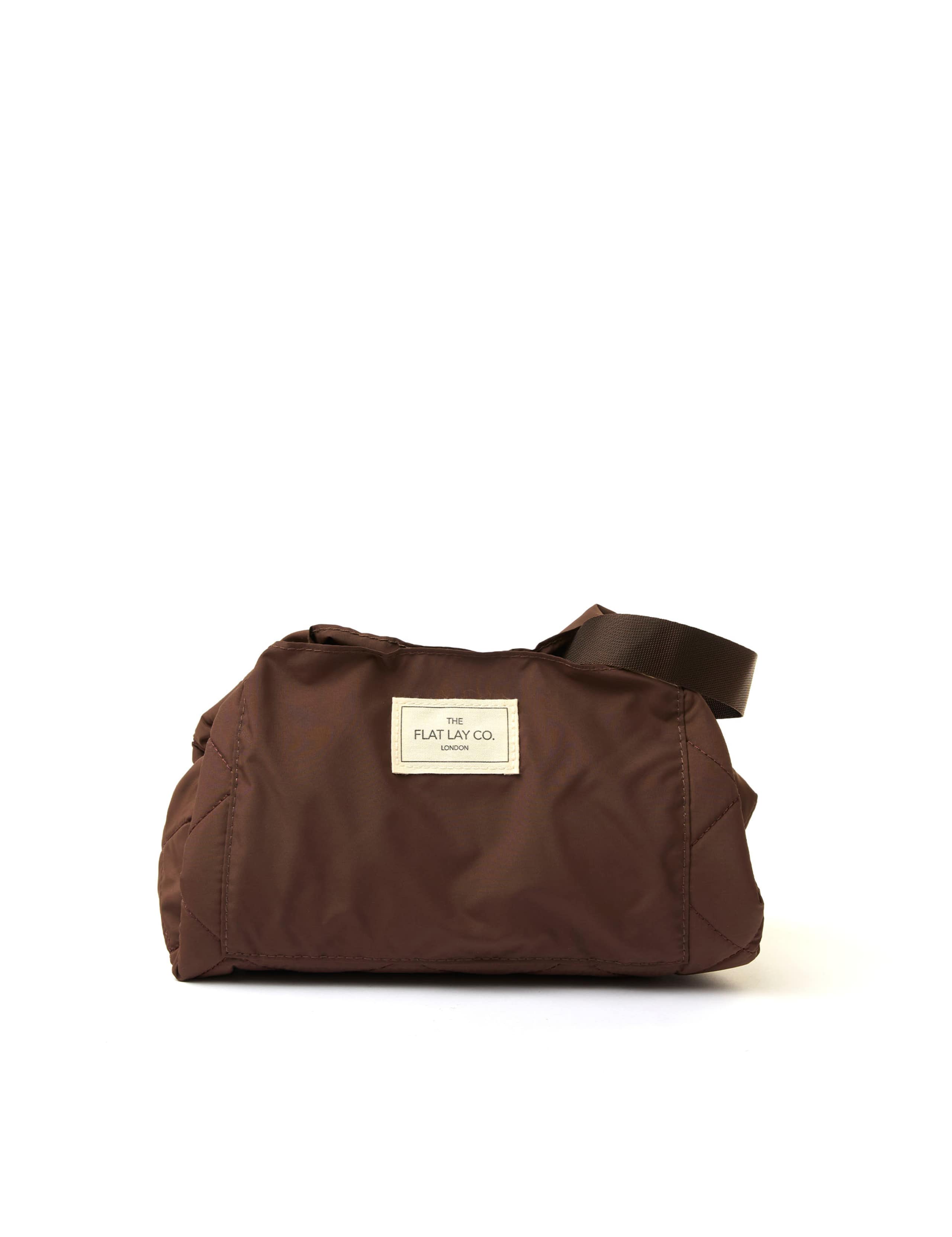 The Flat Lay Co. Espresso makeup bag, imported from the UK