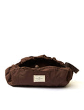 The Flat Lay Co. Espresso makeup bag, imported from the UK