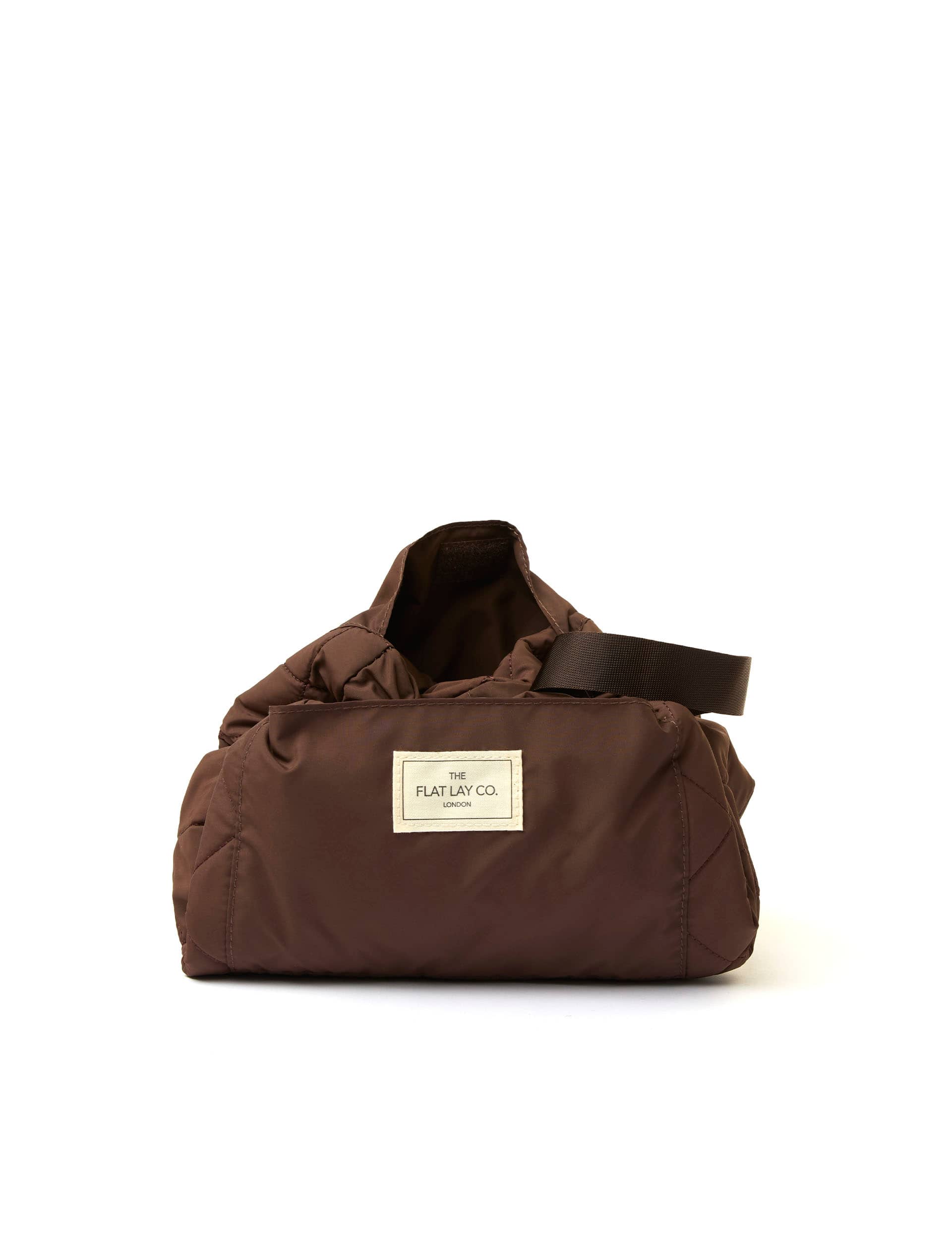 The Flat Lay Co. Espresso makeup bag, imported from the UK