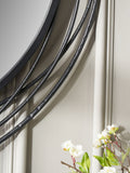 Pacific black metal swirl round wall mirror, imported from the UK