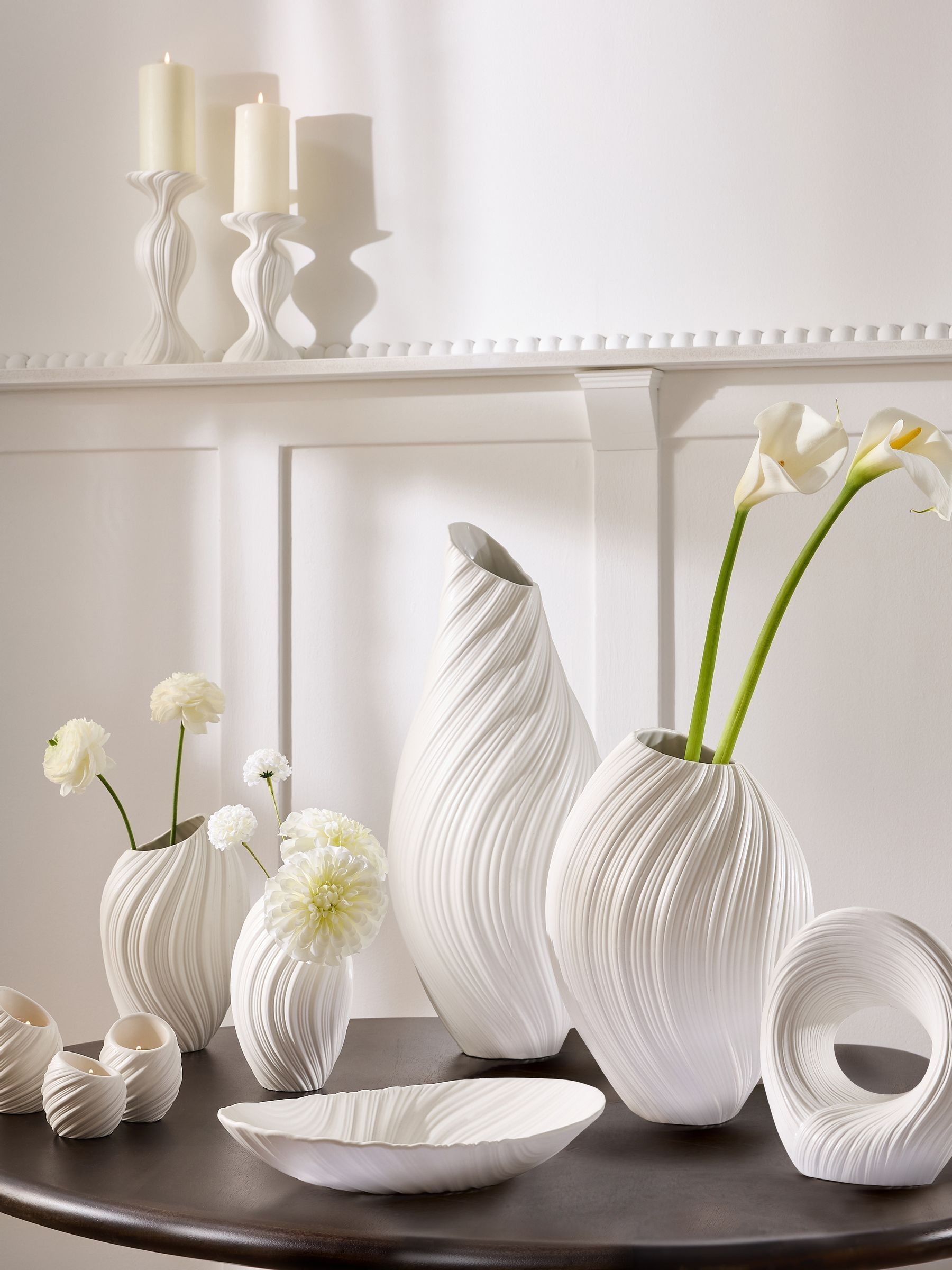 White pleated stoneware ornament with abstract shape (British brand)