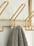 Gold over door hook for towels and robes, UK version