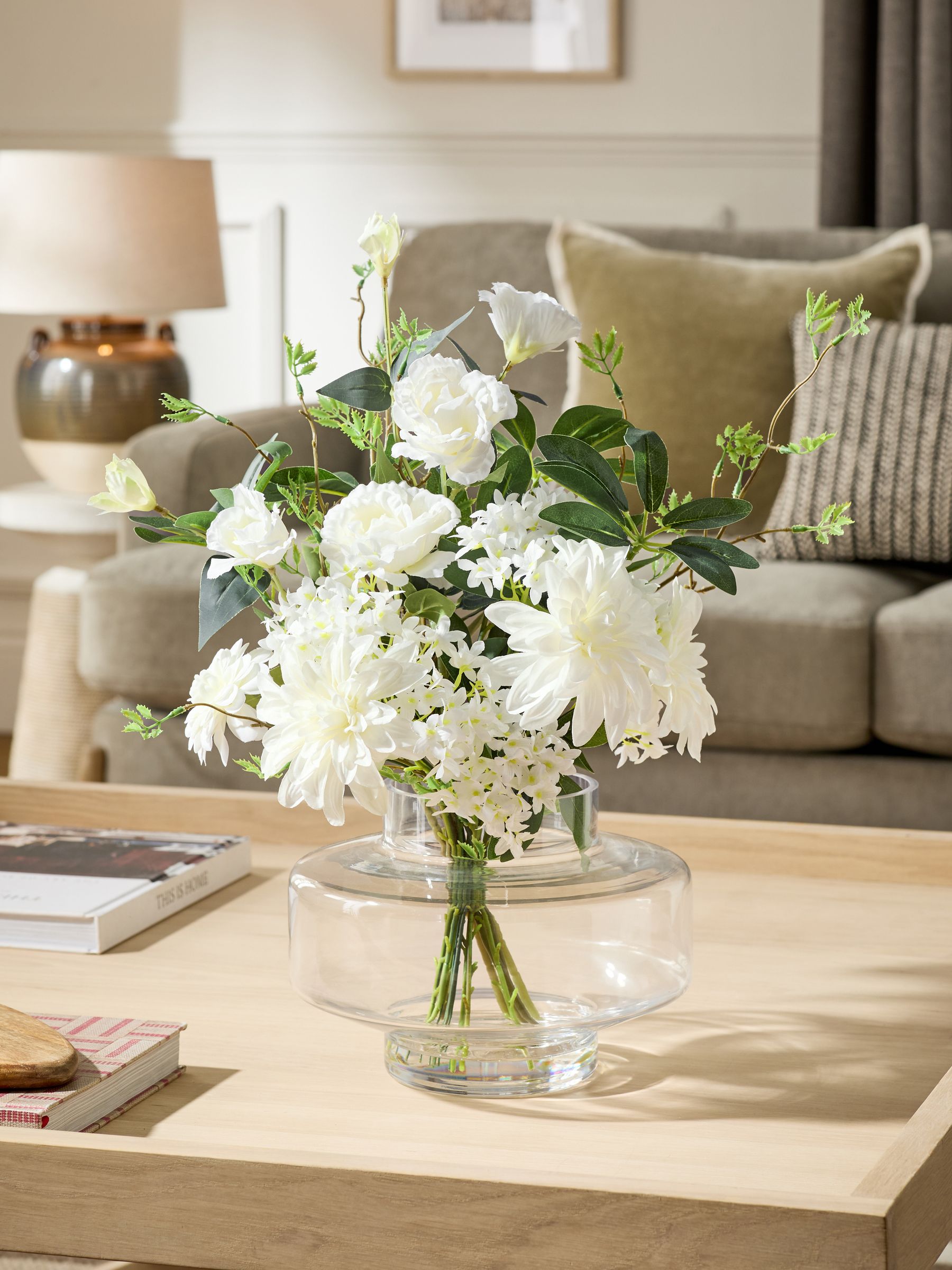 White artificial floral arrangement in glass vase - British product