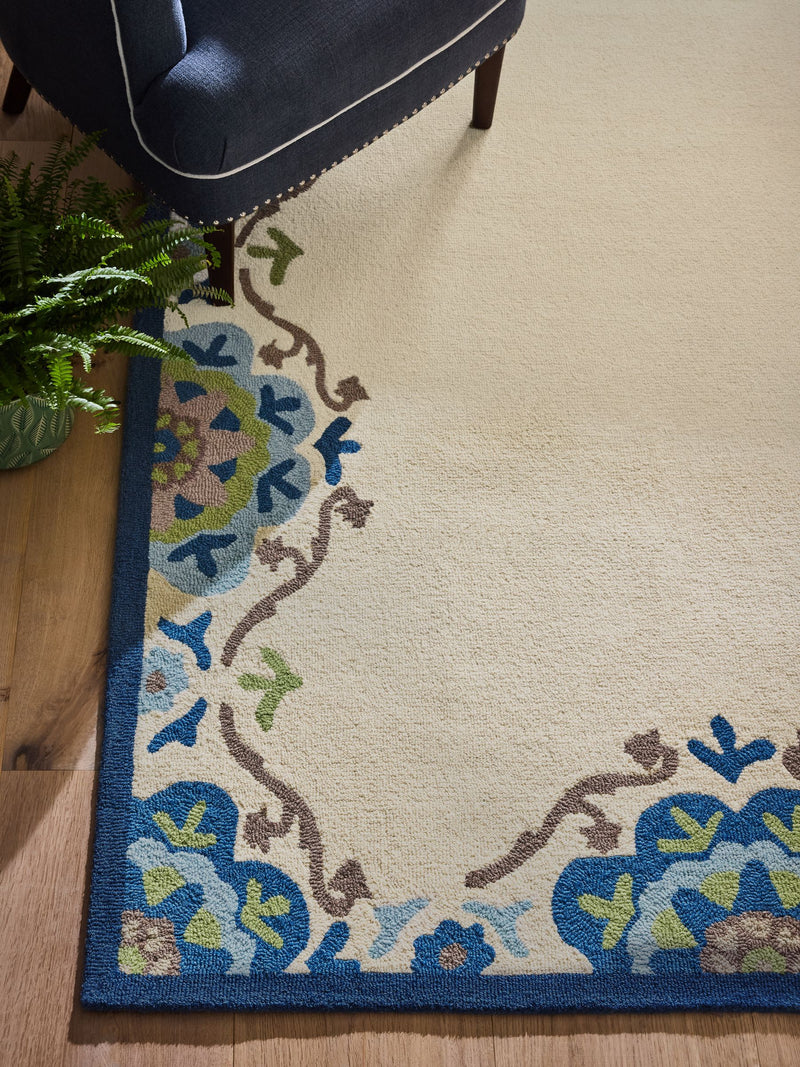 Nina Campbell blue Fergana wool tufted rug - British product