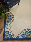 Nina Campbell blue Fergana wool tufted rug - British product