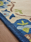 Nina Campbell blue Fergana wool tufted rug - British product