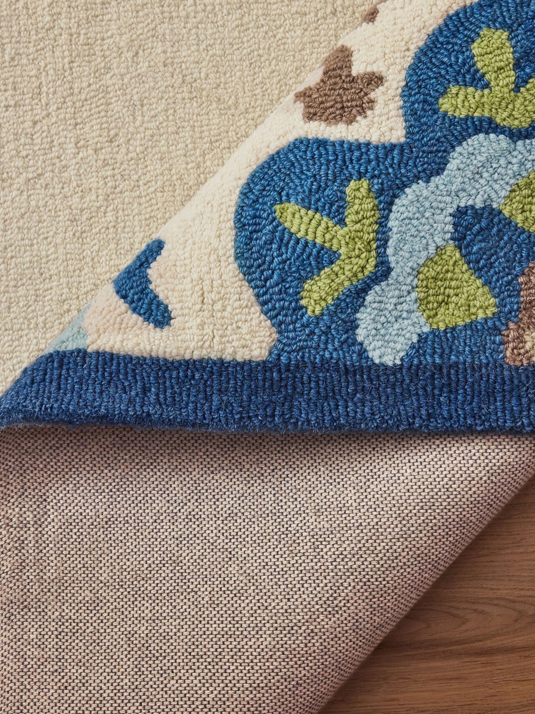 Nina Campbell blue Fergana wool tufted rug - British product