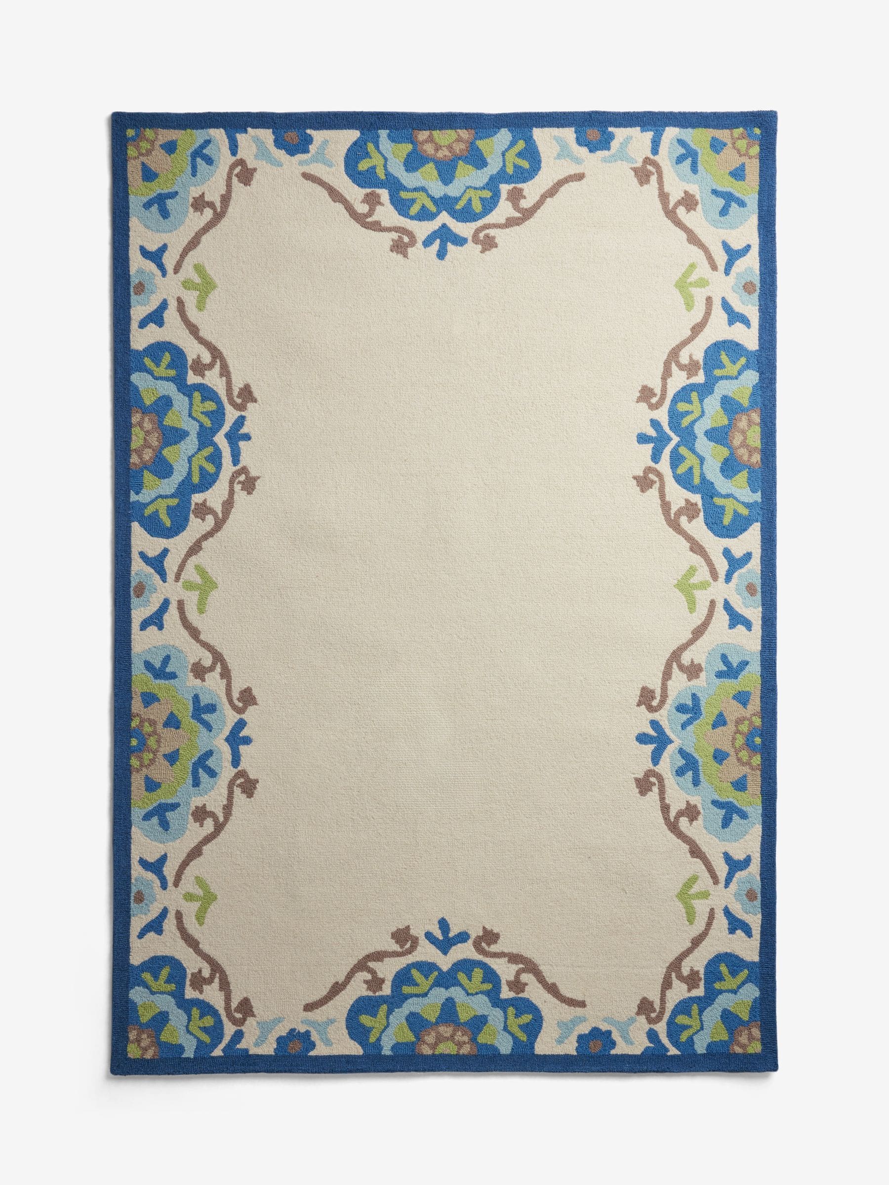 Nina Campbell blue Fergana wool tufted rug - British product