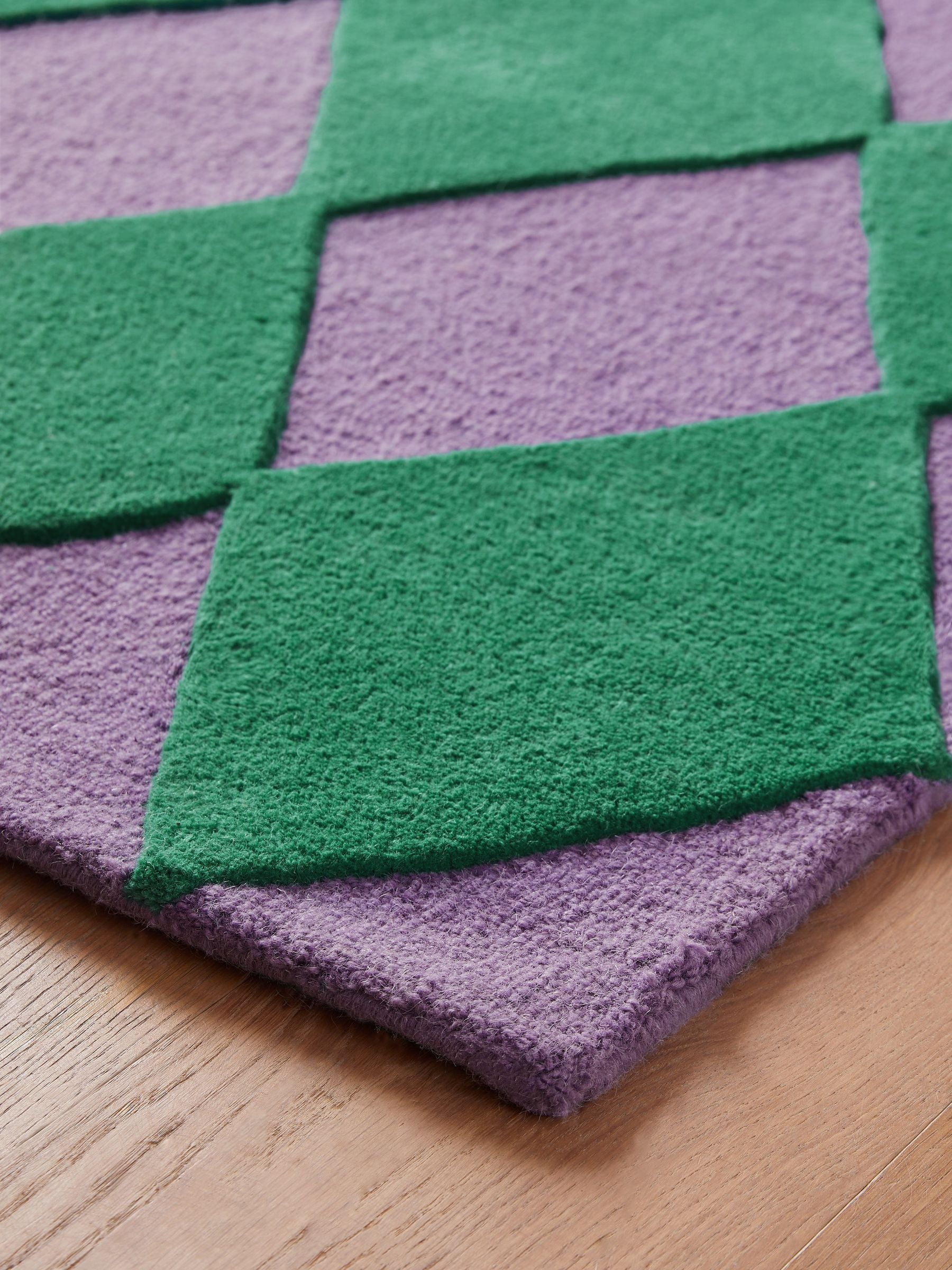 Eleanor Bowmer green purple Harlequin Diamond tufted rug, imported from the UK