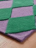 Eleanor Bowmer green purple Harlequin Diamond tufted rug, imported from the UK