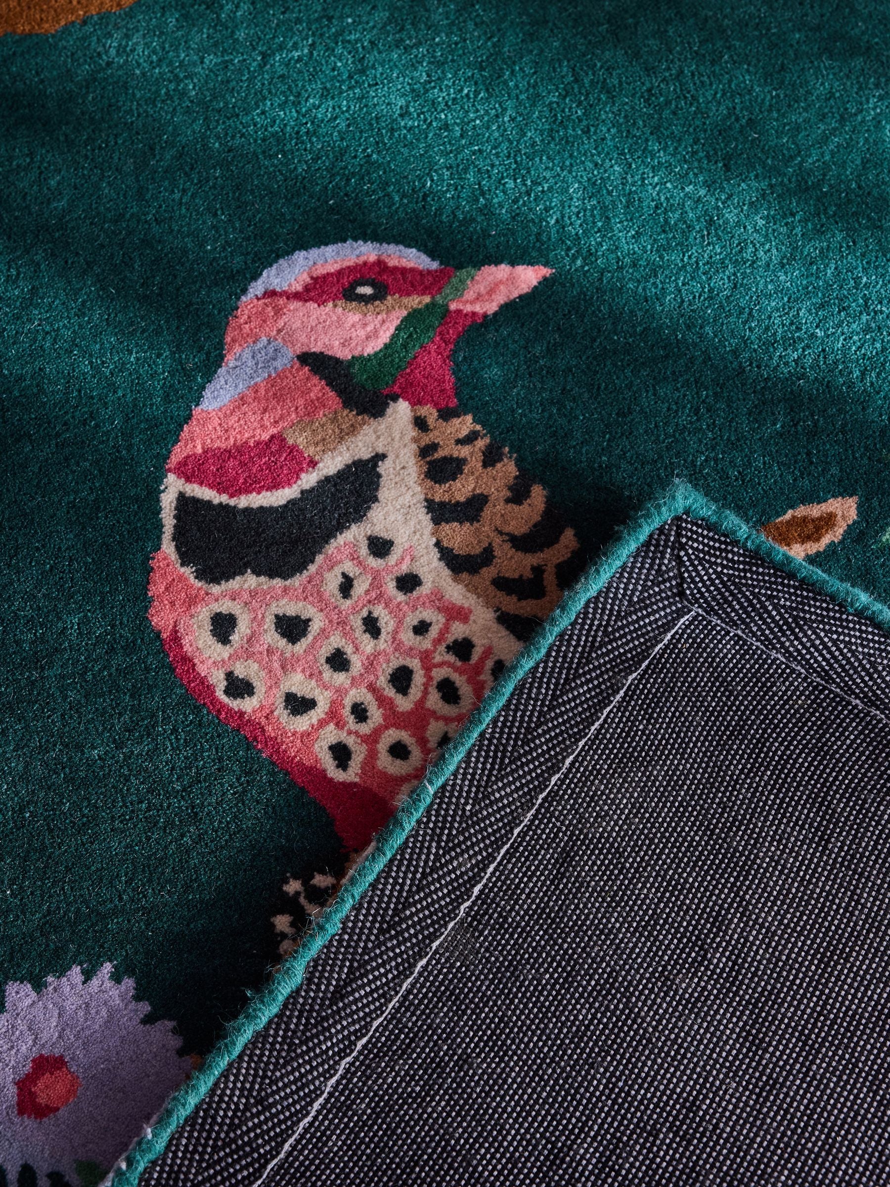 Cath Kidston teal birds and berries wool tufted rug, imported from the UK