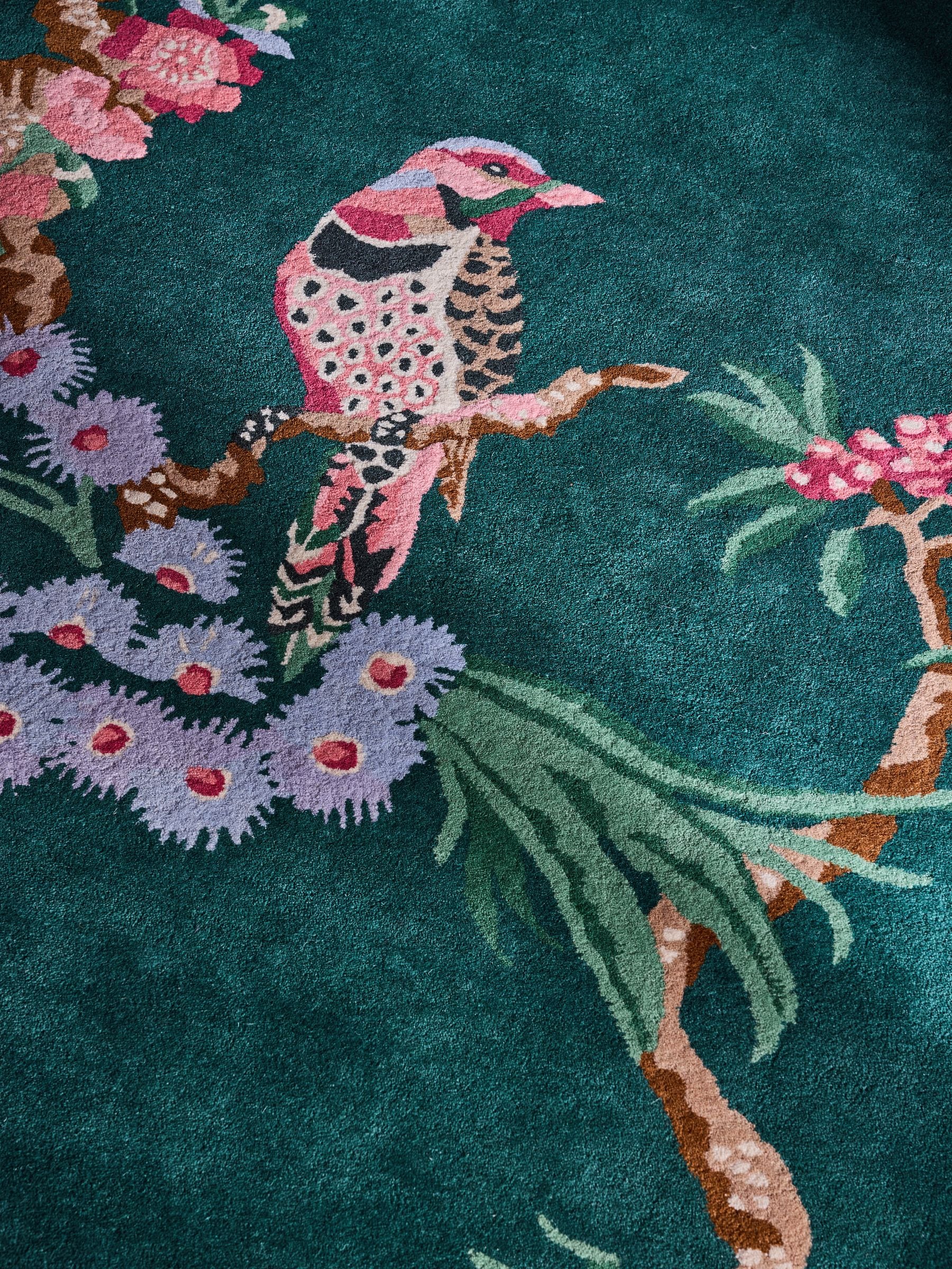 Cath Kidston teal birds and berries wool tufted rug, imported from the UK