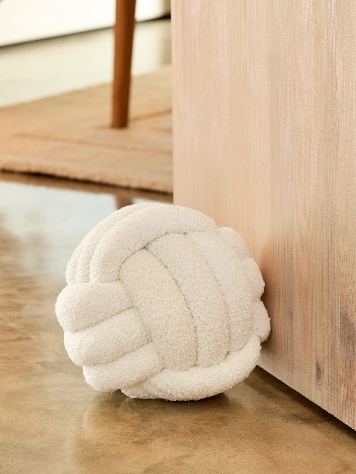 Natural Boucle Knot doorstop, imported from the UK