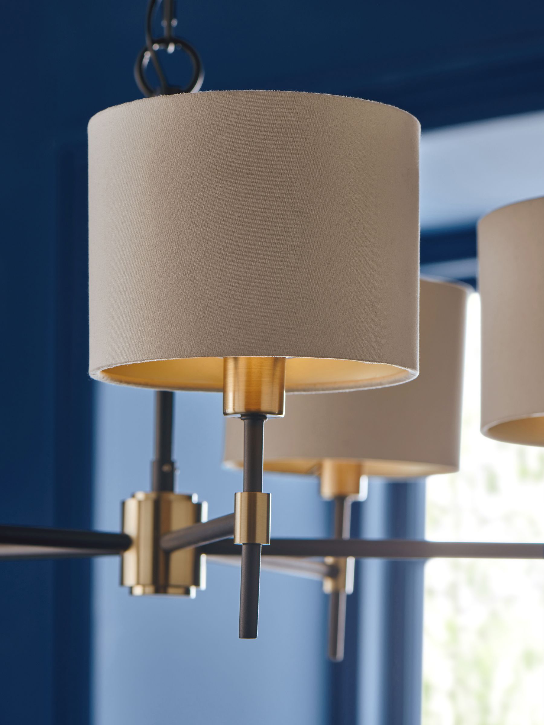 Black Hudson 5-light chandelier with brass accents, imported from the UK