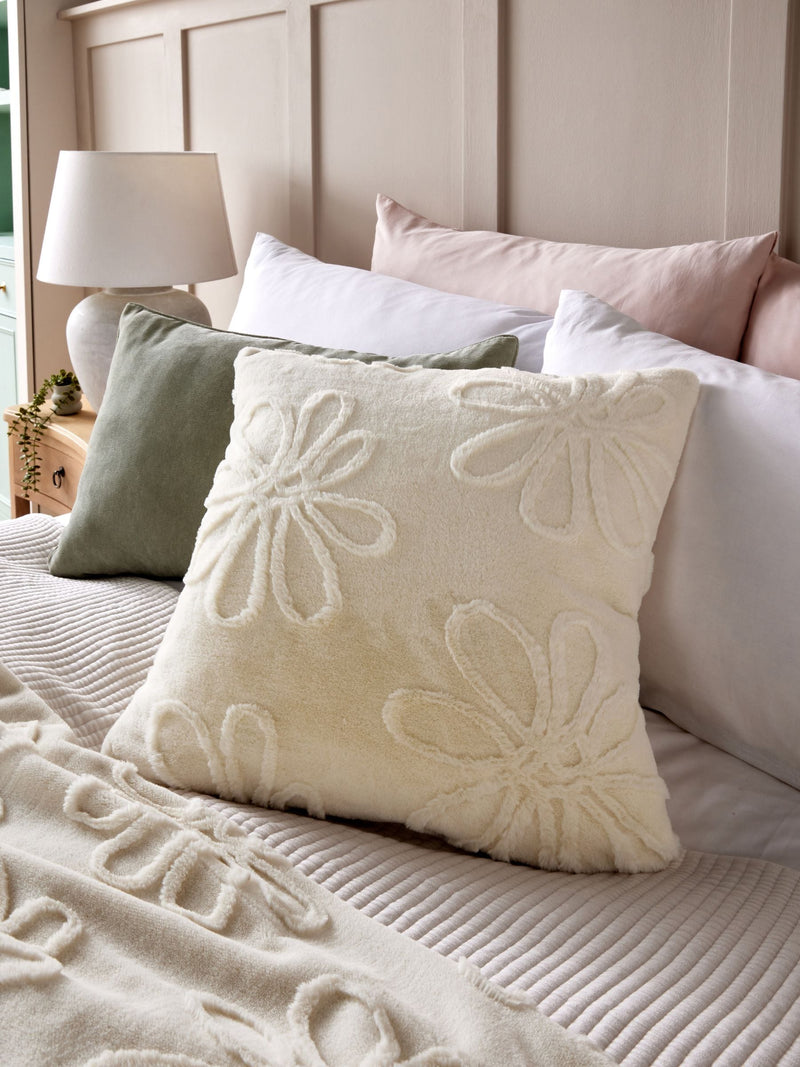 Cream faux fur daisy cushion 50x50cm, imported from the UK