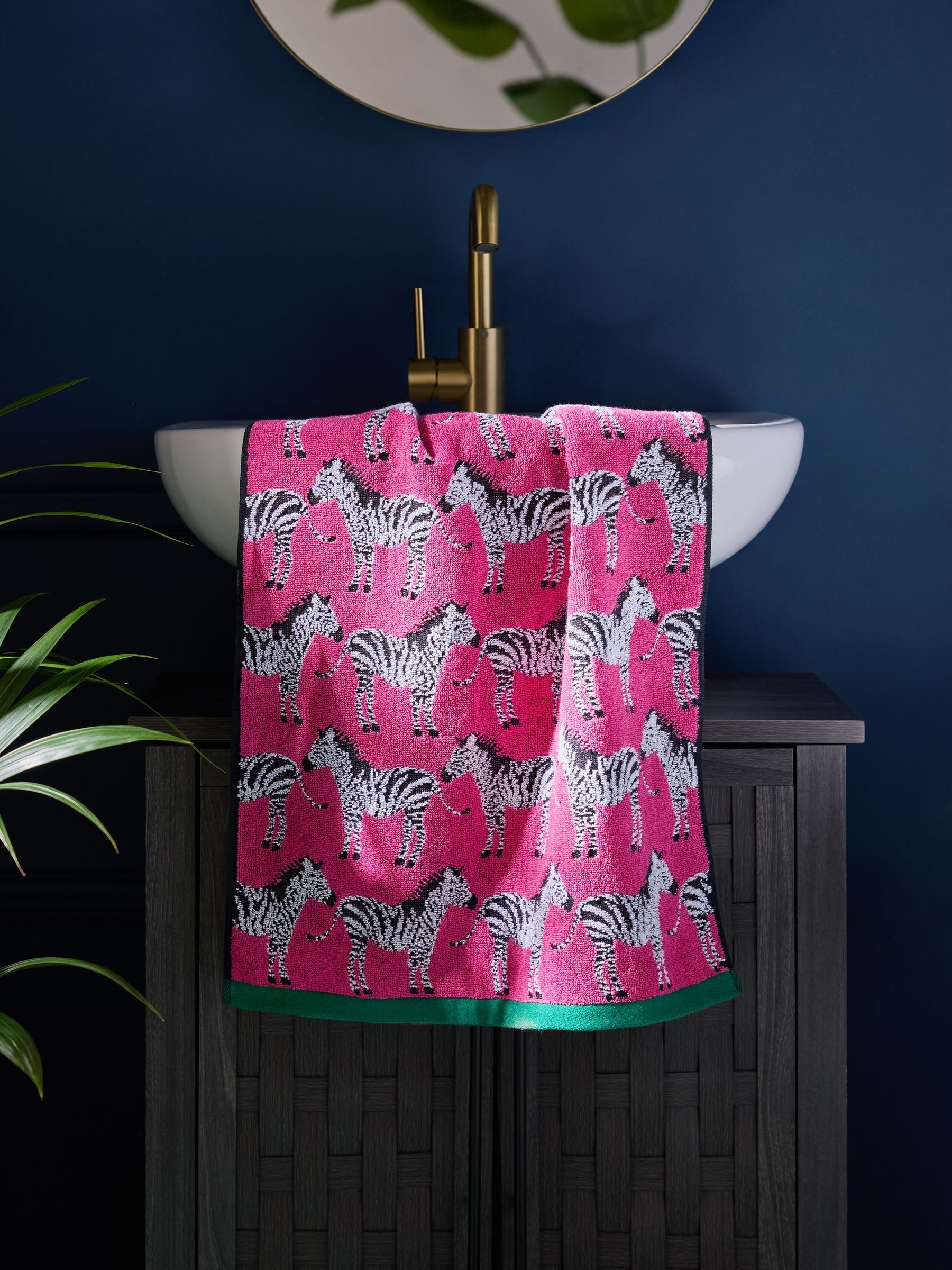 Pink Zebra cotton towels with zebra print, imported from the UK