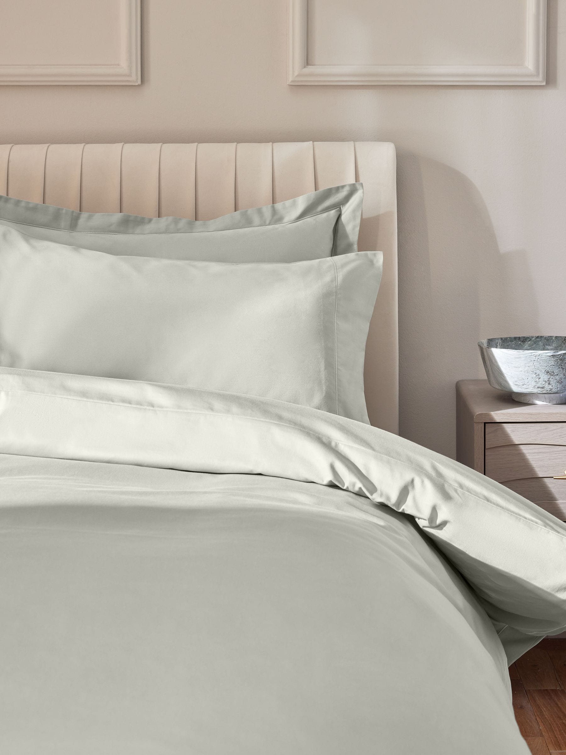 Pale sage green duvet cover and pillowcase set, imported from the UK