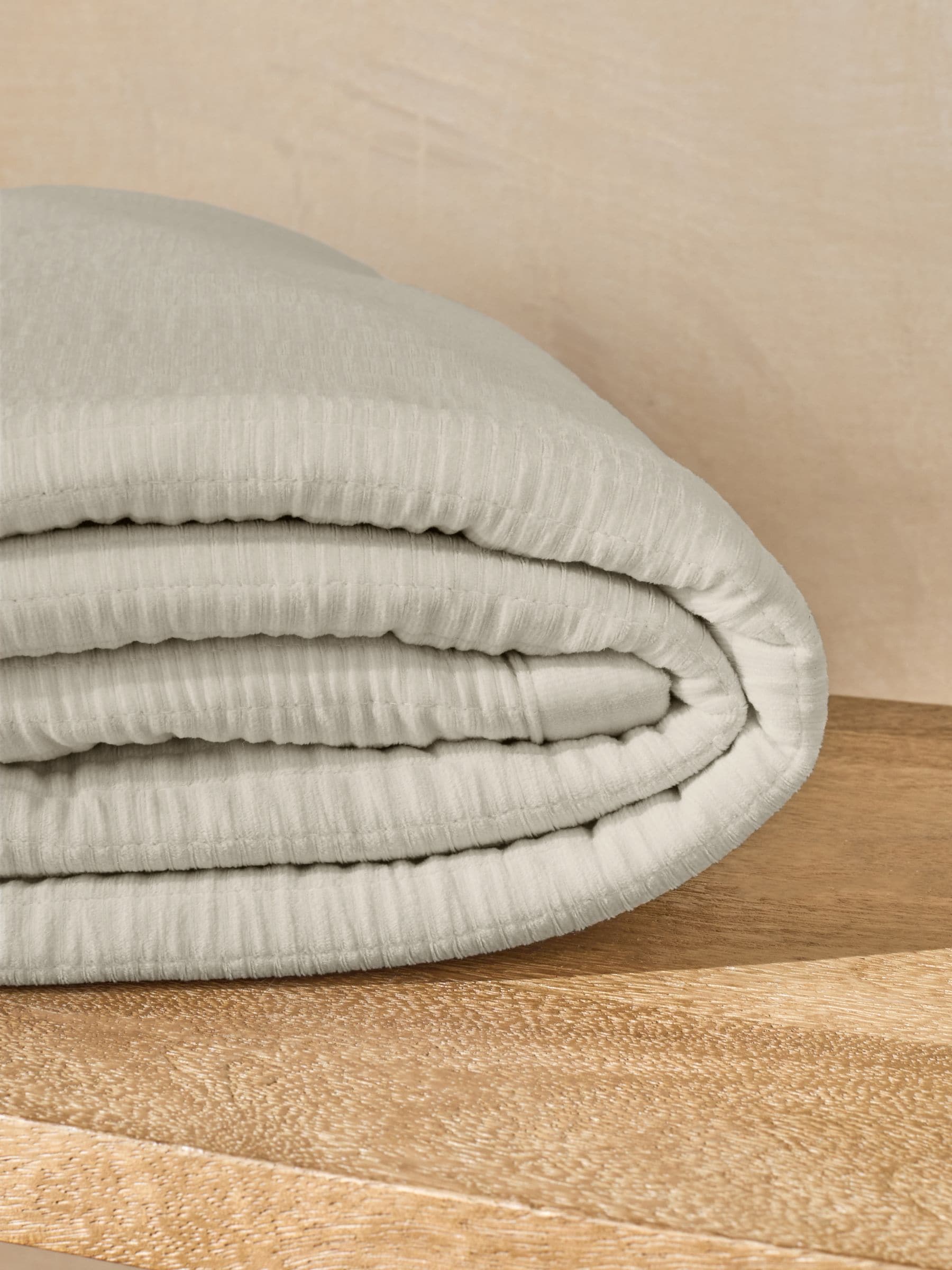 Natural Carrie quilted velvet bedspread, imported from the UK