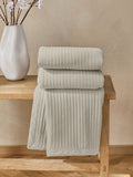 Natural Carrie quilted velvet bedspread, imported from the UK
