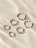 Stainless steel graduated huggie hoop earrings 3 pack (British brand)