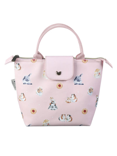 Isolierte rosa Lunchtasche mit Hundemotiven
