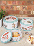 Set of Three Blue Nesting Cake Tins with Woodland Illustrations and Teal Edging