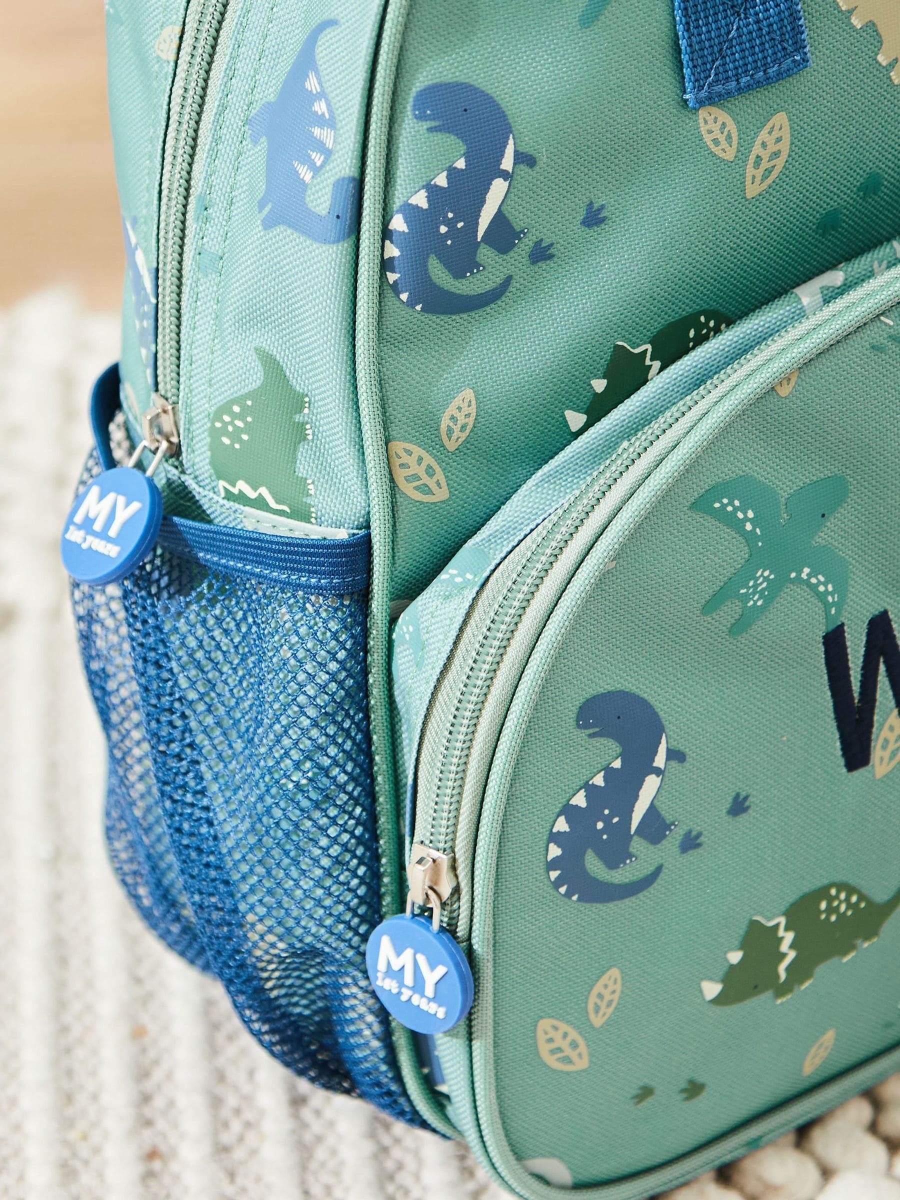 My 1st Years personalised dinosaur print medium backpack, UK version