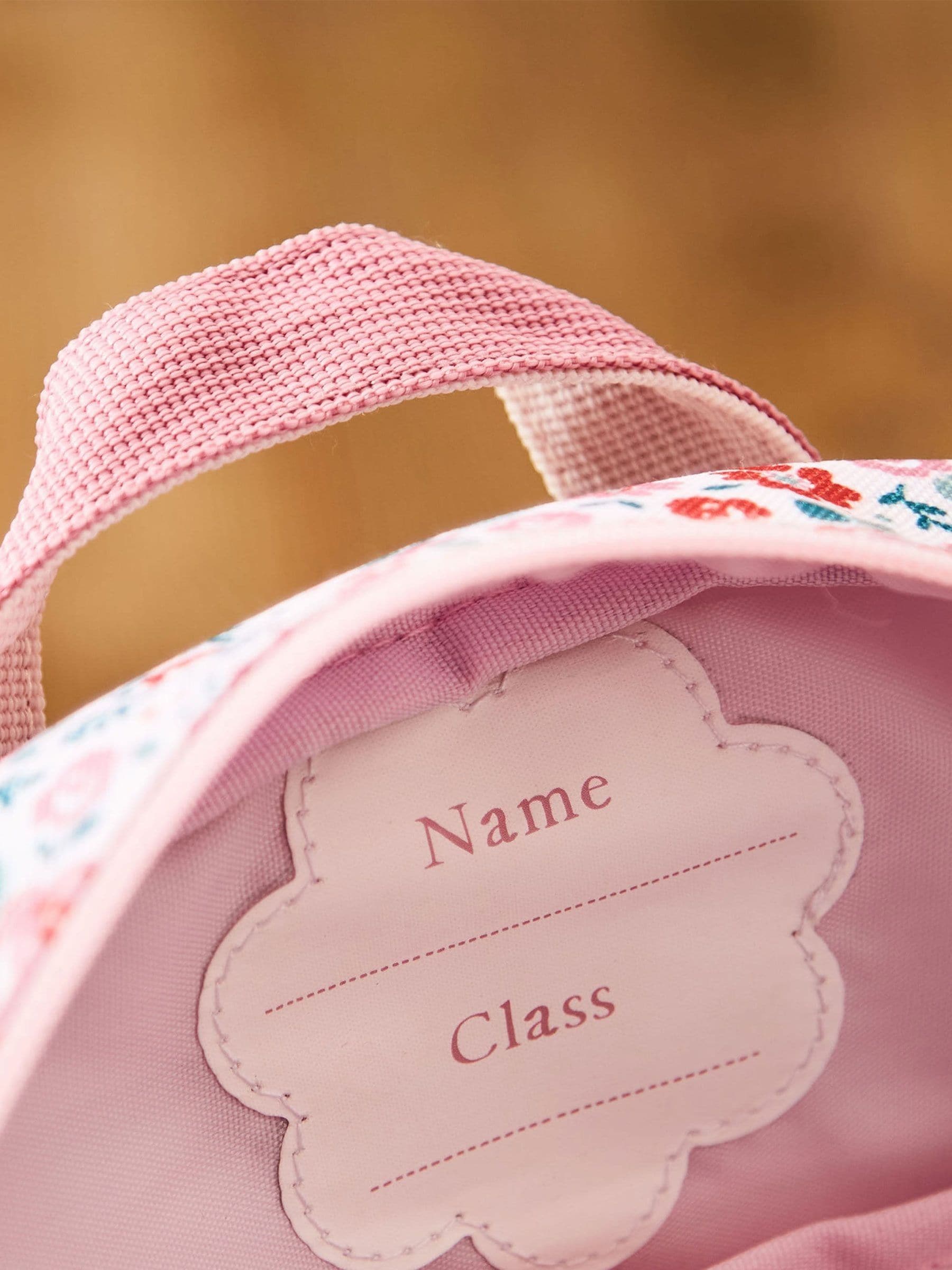 My 1st Years pink ditsy print medium grab handle backpack, UK version