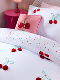 Red Cherry Poms printed polycotton duvet cover and pillowcase set, imported from the UK