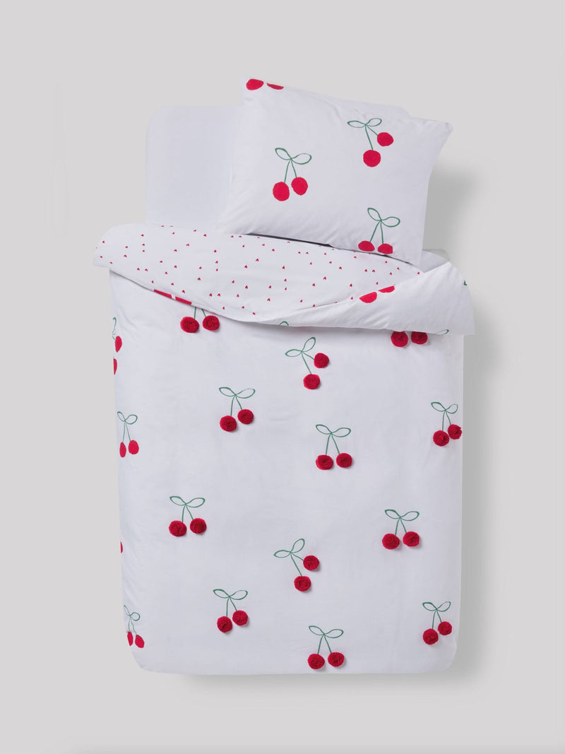 Red Cherry Poms printed polycotton duvet cover and pillowcase set, imported from the UK