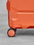 Rock Tulum medium suitcase in orange, imported from the UK