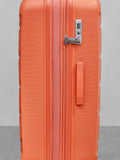 Rock Tulum medium suitcase in orange, imported from the UK