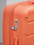Rock Tulum medium suitcase in orange, imported from the UK