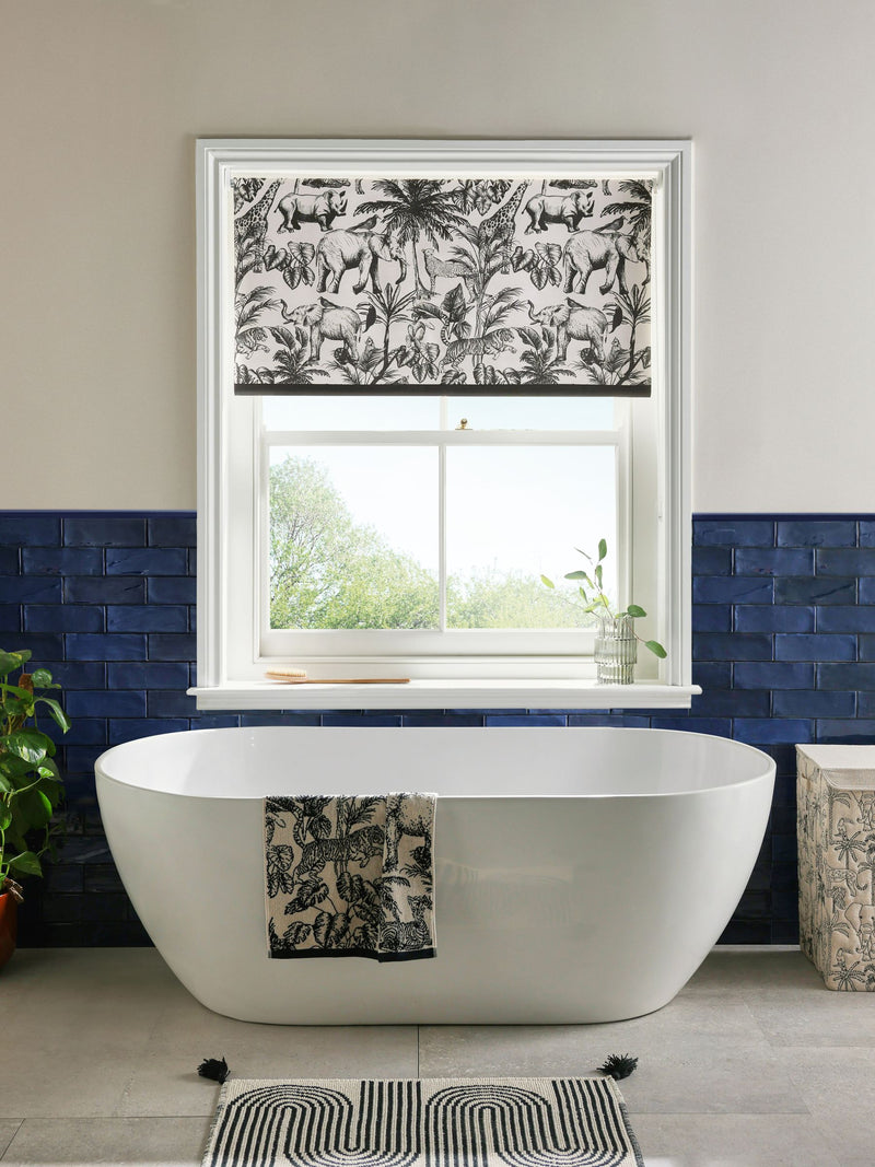 Monochrome safari print blackout bathroom roller blind, UK version