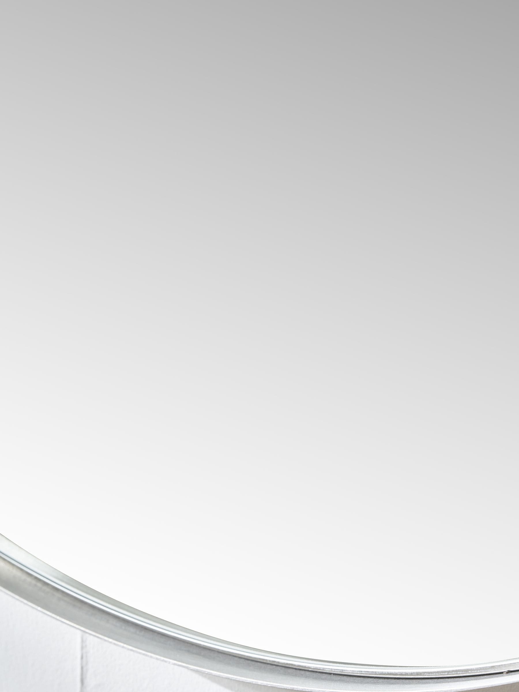 Pacific round wall mirror brushed silver small (British brand)