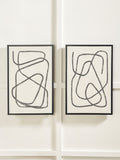 Black and white squiggle print canvases with frames, imported from the UK