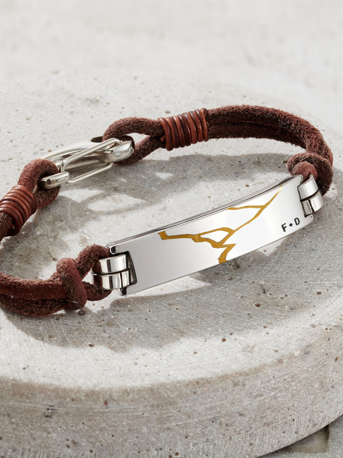 Posh Totty Designs personalised Kintsugi leather cord bracelet in dark brown leather, imported from the UK