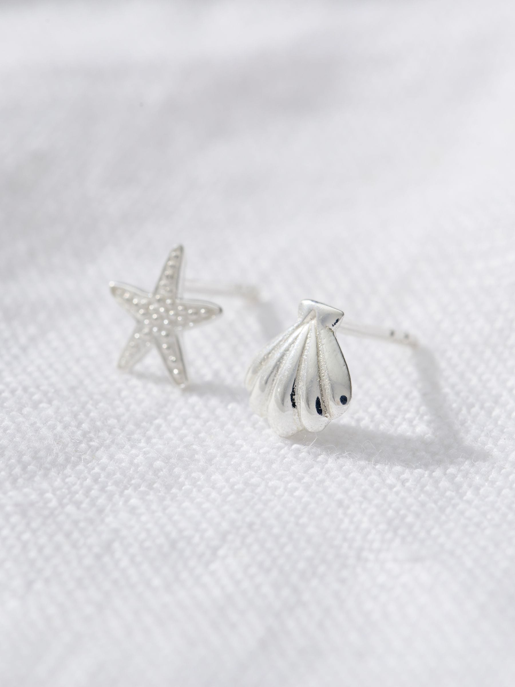 Posh Totty Designs sterling silver starfish and shell stud earrings, imported from the UK