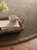Origin Rugs sage green hand woven sisal circle rug, UK version