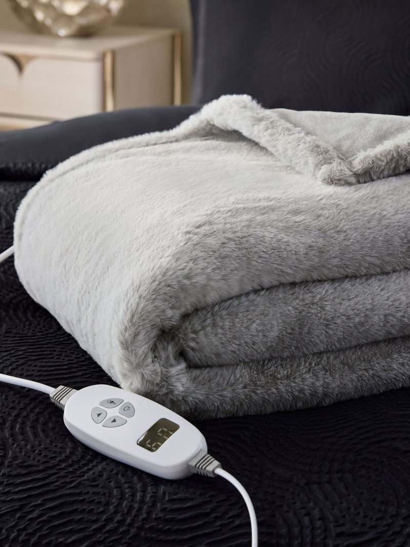 Grey plush electric heated faux fur throw, imported from the UK