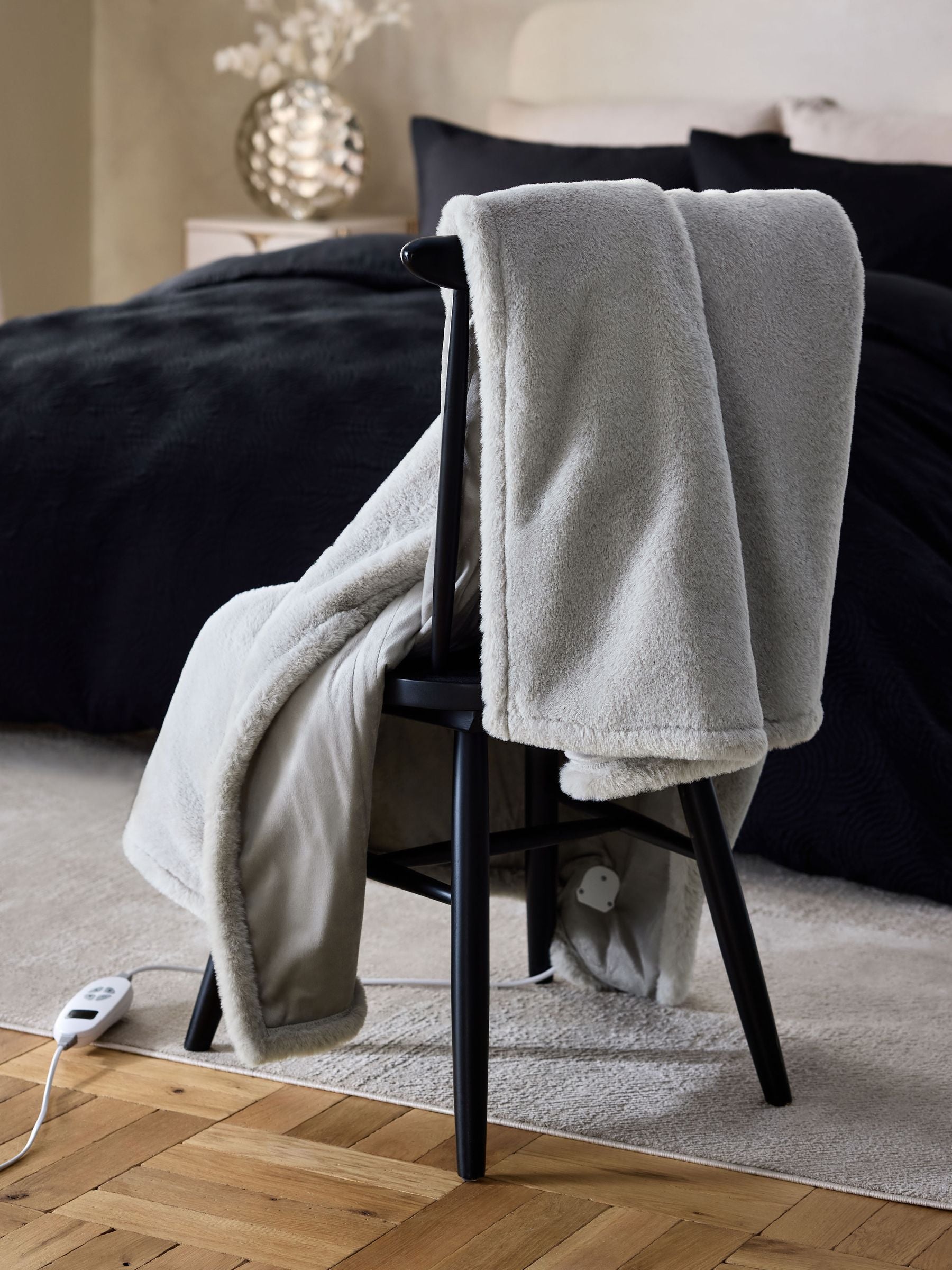Grey plush electric heated faux fur throw, imported from the UK