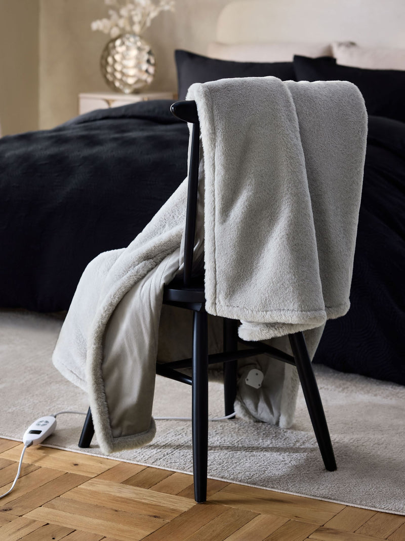 Grey plush electric heated faux fur throw, imported from the UK
