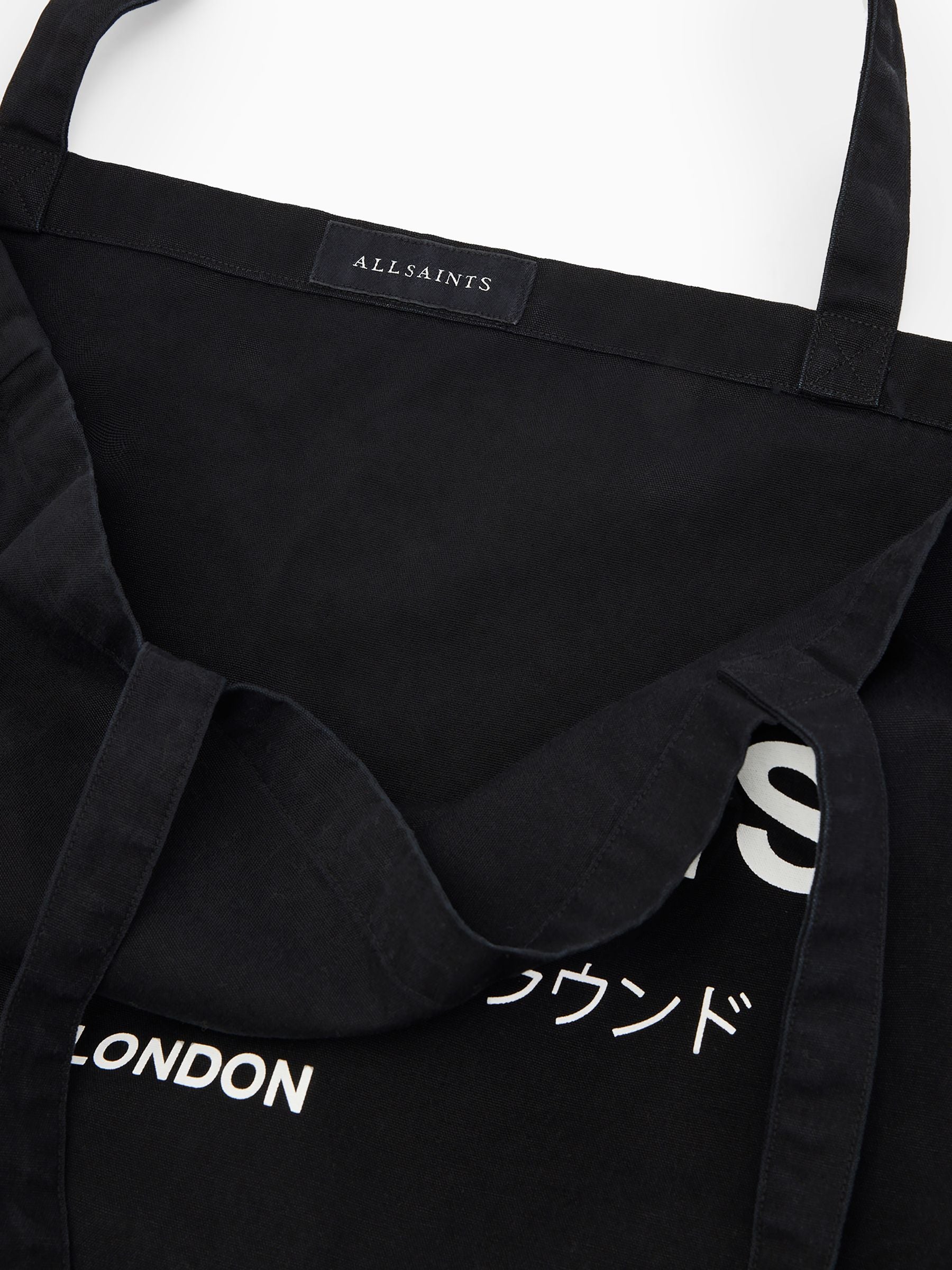 AllSaints Black Future tote bag with Underground graphic, UK version