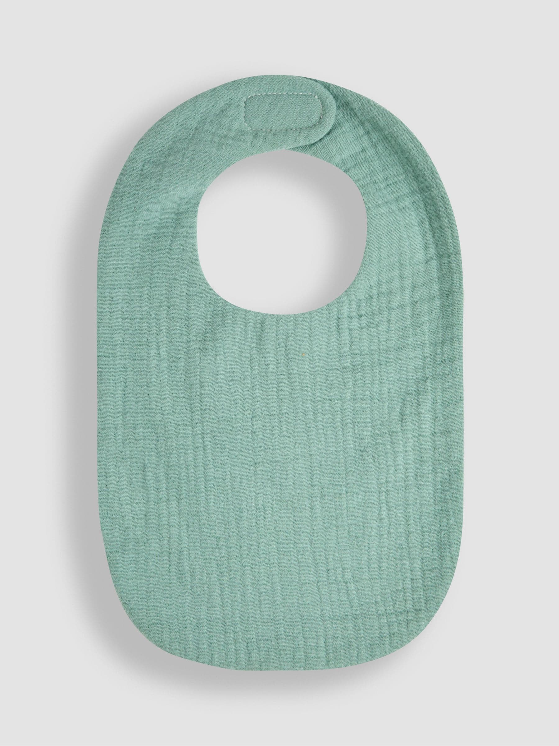 JoJo Maman Bébé green muslin frill bib, UK version